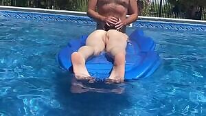 Getting my tan on at the pool