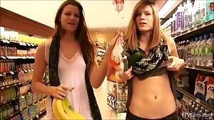 Twins flashing in the grocery store with bananas for scale