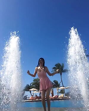 Sulli dancing in a cute dress