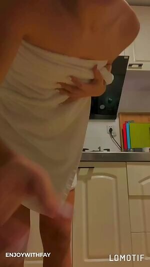 Behind the towel