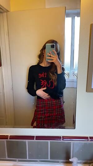 The mildest, most innocent little bra flash in my plaid skirt.