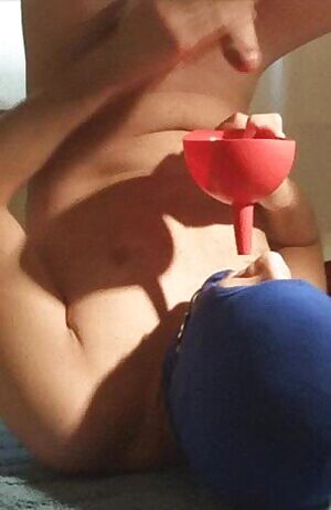 Eating all of my delicious cum with a funnel