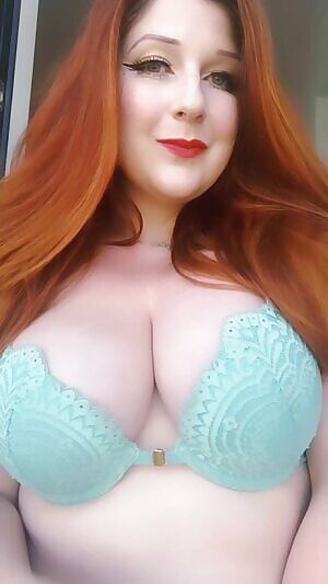 I'm a wholesome redhead MILF flashing her neighbours on the balcony